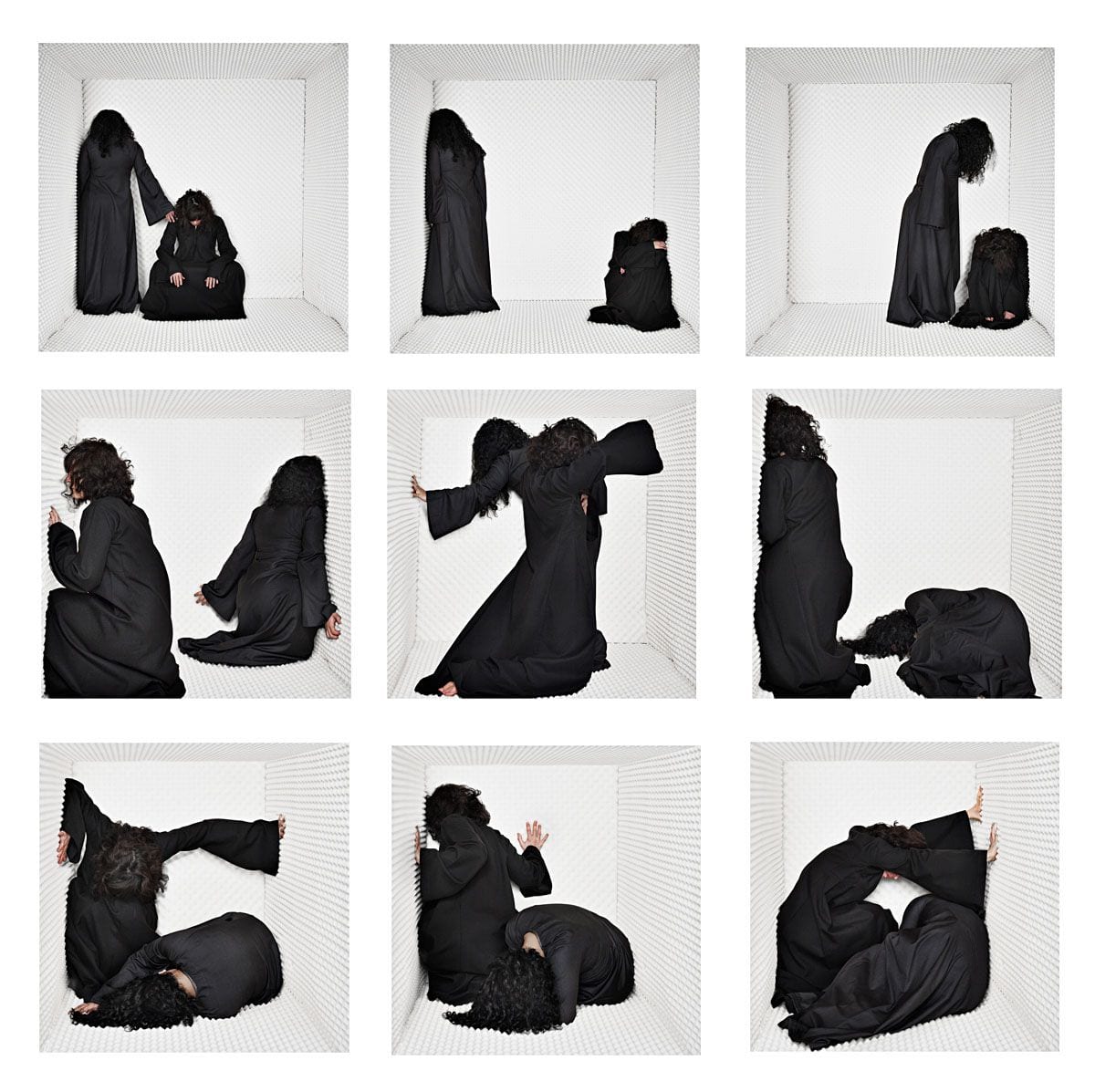 A nine-panel grid of two robed figures inside a collapsing padded white room — Baghdadi Mem/Wars, Still/Chaos
